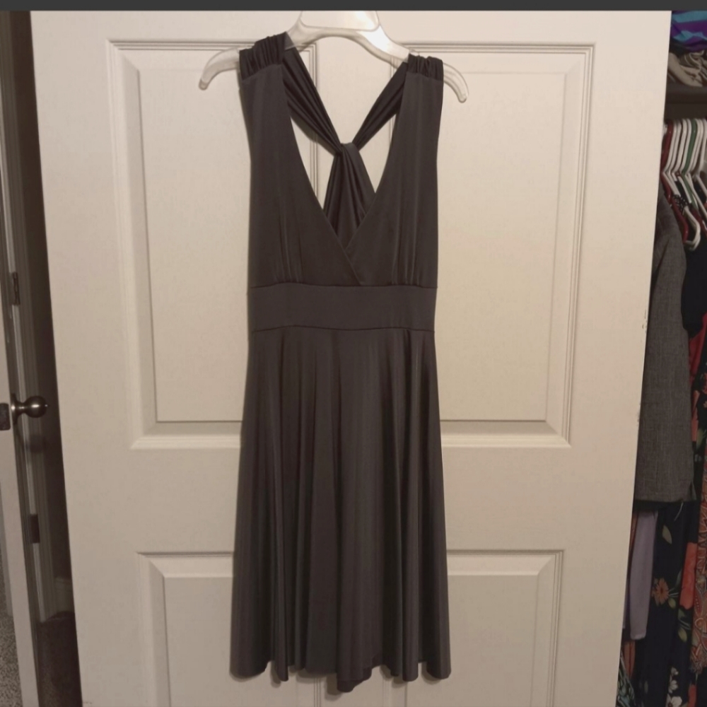 Large silver, silky dress